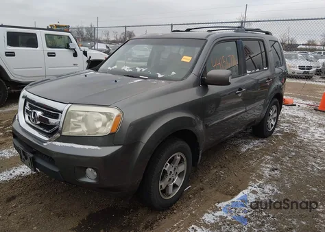 2010 Honda Pilot Touring z USA, uszkodzony, nr VIN 5FNYF4H95AB007606